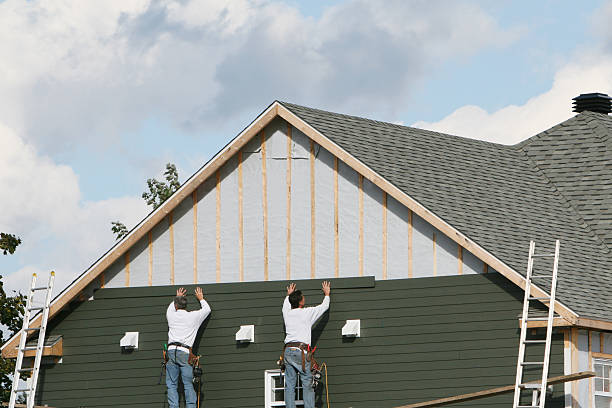 Professional Siding technician working in Sargent, TX